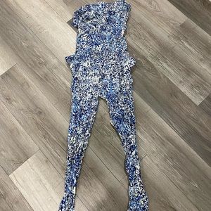I love H8I halter top romper size medium multicolor blue.